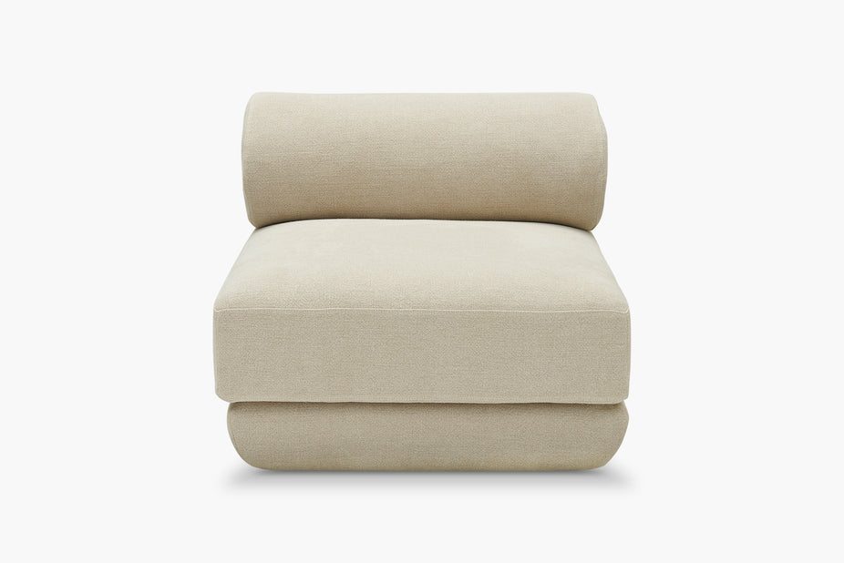 cream armless armchair